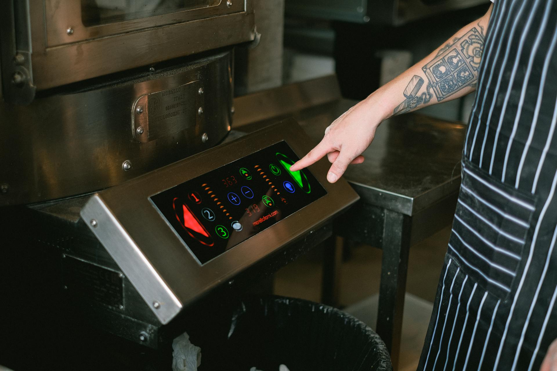 Professional chef using digital tools